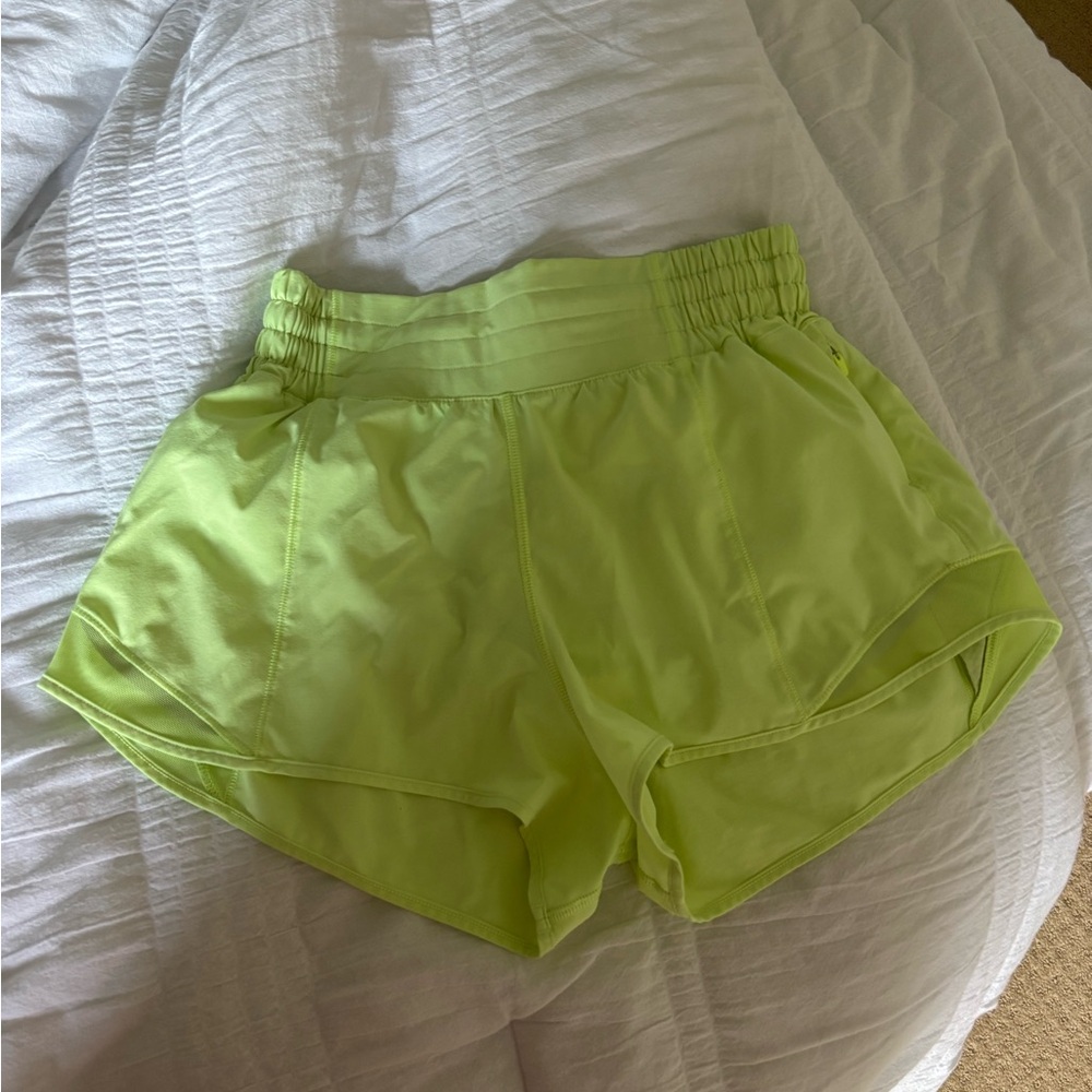 lululemon high rise 2.5" hotty hot shorts in highlighter yellow